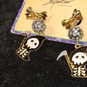 Halloween pierced earrings. The Grim Reaper. They are adorable.​​